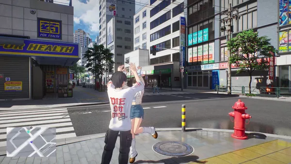 Two people posing for a photograph beside a zebra crossing and a red fire hydrant.